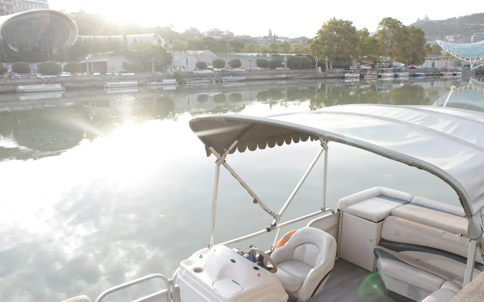 Pontoon boat on a calm lake