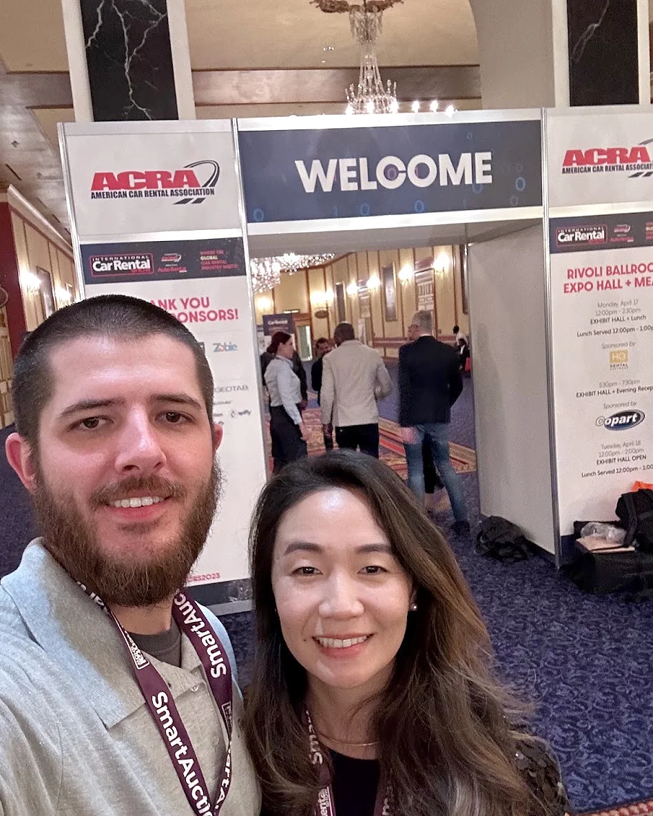 Chad and Min at the ACRA welcome arch outside the Rivoli Ballroom expo hall